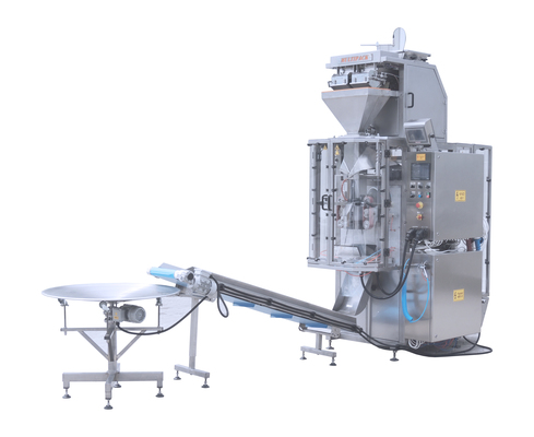 2020-02 TT 30-60 Automata csomagológép ikermérleges adagolóval, kihordó- szállítószalaggal, gyűjtő körasztallal – kőörlemény csomagolás